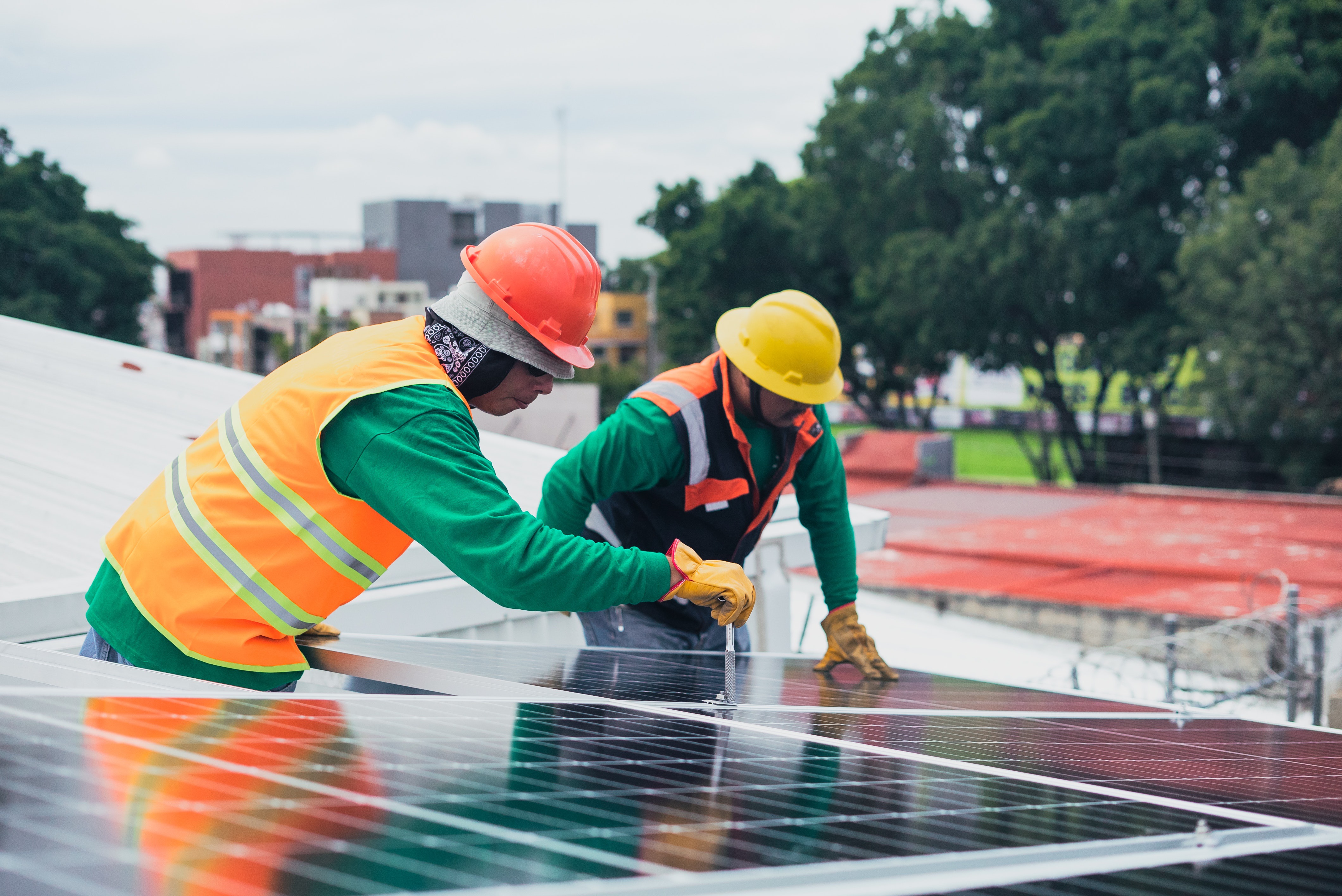 ADYSURVE engineering professionals working on a solar installation